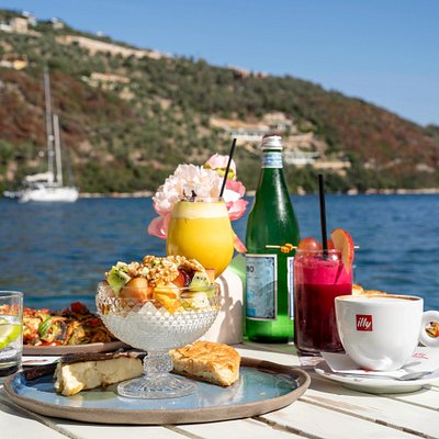Food and drinks at a seaside restaurant in Sivota Greece